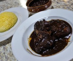 Oxtail with Black Beans and Yellow Rice
